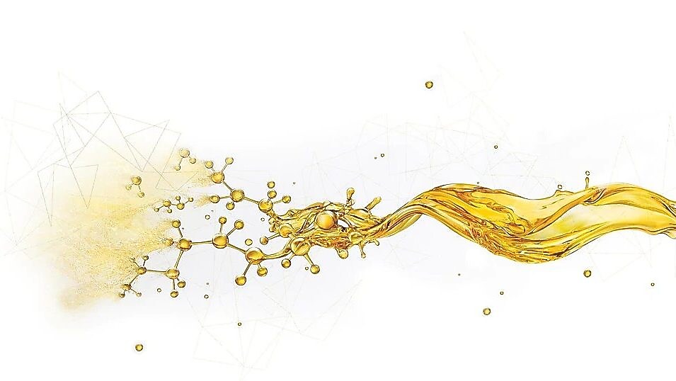 Salpicaduras de aceite rompiéndose en pequeños componentes