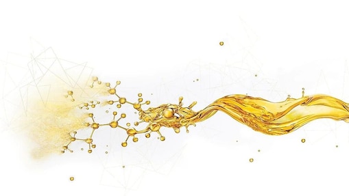 Salpicaduras de aceite rompiéndose en pequeños componentes